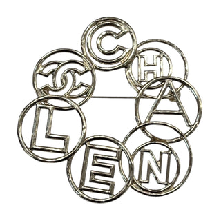 Chanel Gold “CHANEL” Letter Circle Brooch