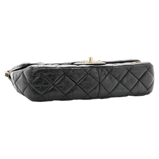 Chanel Black Aged Calfskin Quilted Medium Charm Medallion Flap Bag