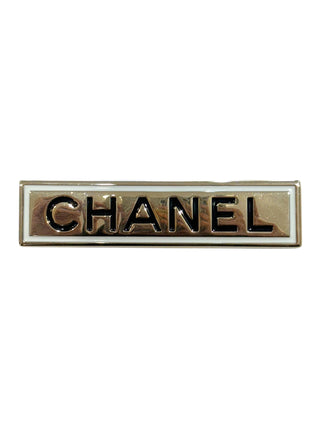 Chanel Gold-Tone Logo Bar Brooch With Black Enamel Lettering