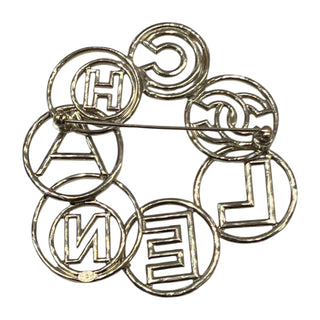 Chanel Gold “CHANEL” Letter Circle Brooch