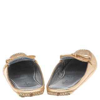 Louis Vuitton Gold Monogram embossed leather Gloria backless Loafers