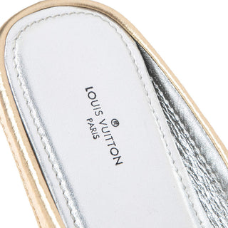 Louis Vuitton Gold Monogram embossed leather Gloria backless Loafers